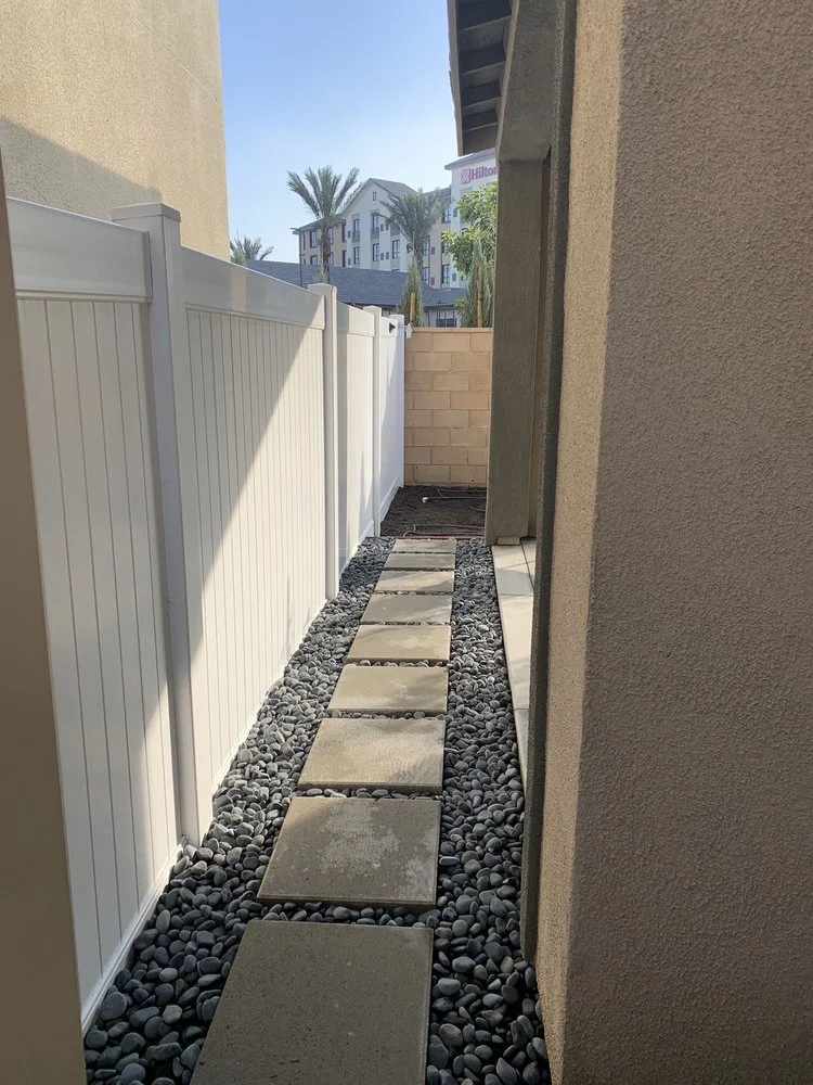 Stepping stones through a narrow side yard